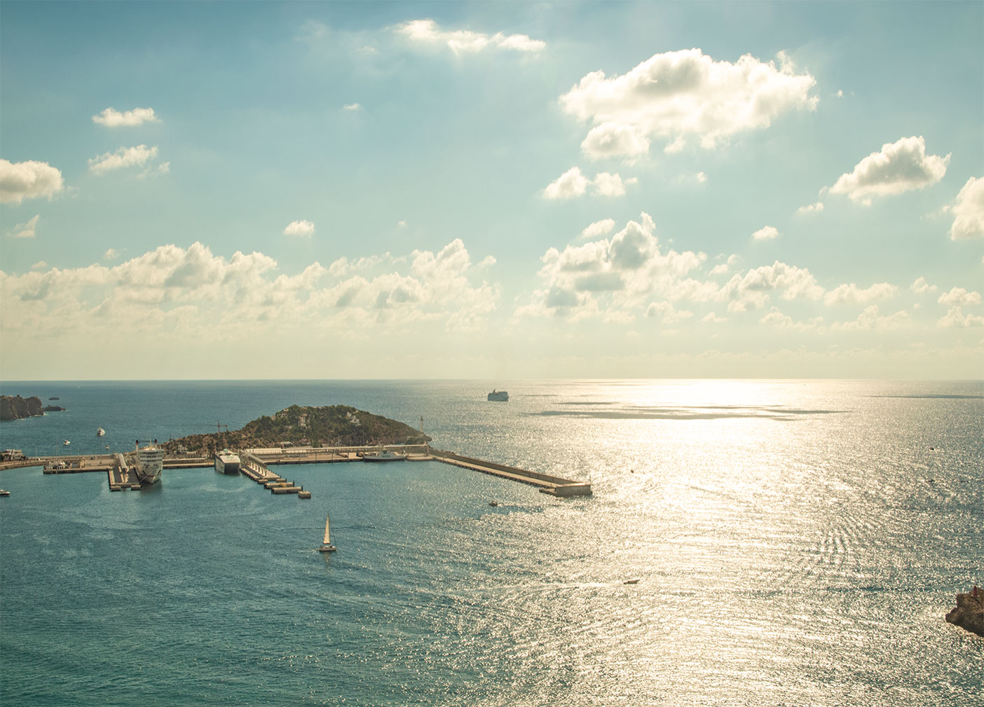 Girl watching Eivissa harbour of Ibiza from Castell d'Eivissa, Catalonia, Spain. (Nos Dren).