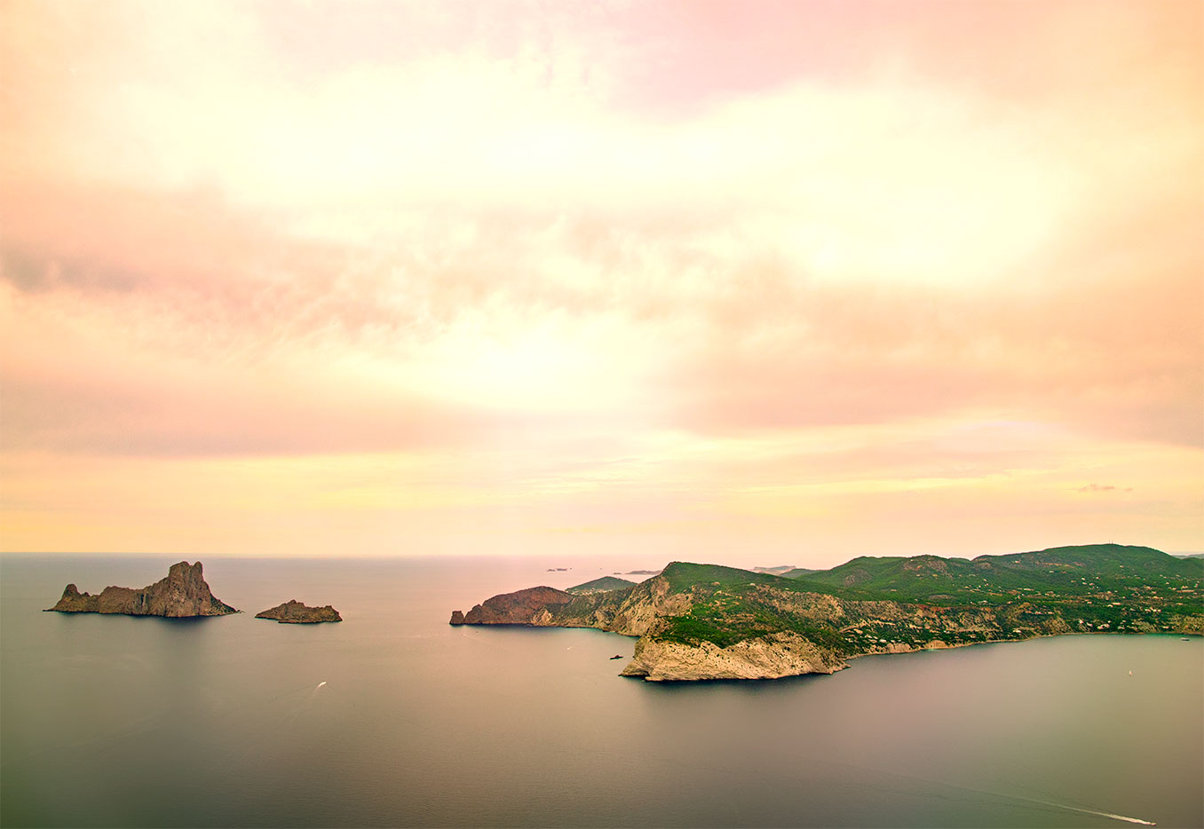 Ibiza island seen from the sky by sunset and mist fog on the hills, Catalonia, Spain. (Nos Dren).