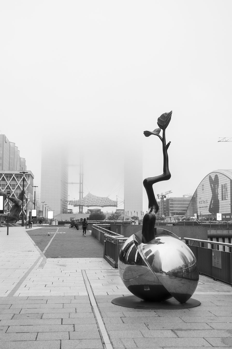 Mist and fog through the skyscrapers of Paris La Defense, France. (Nos Dren)