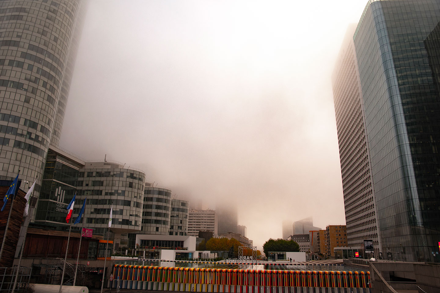 Mist and fog through the skyscrapers of Paris La Defense, France. (Nos Dren)