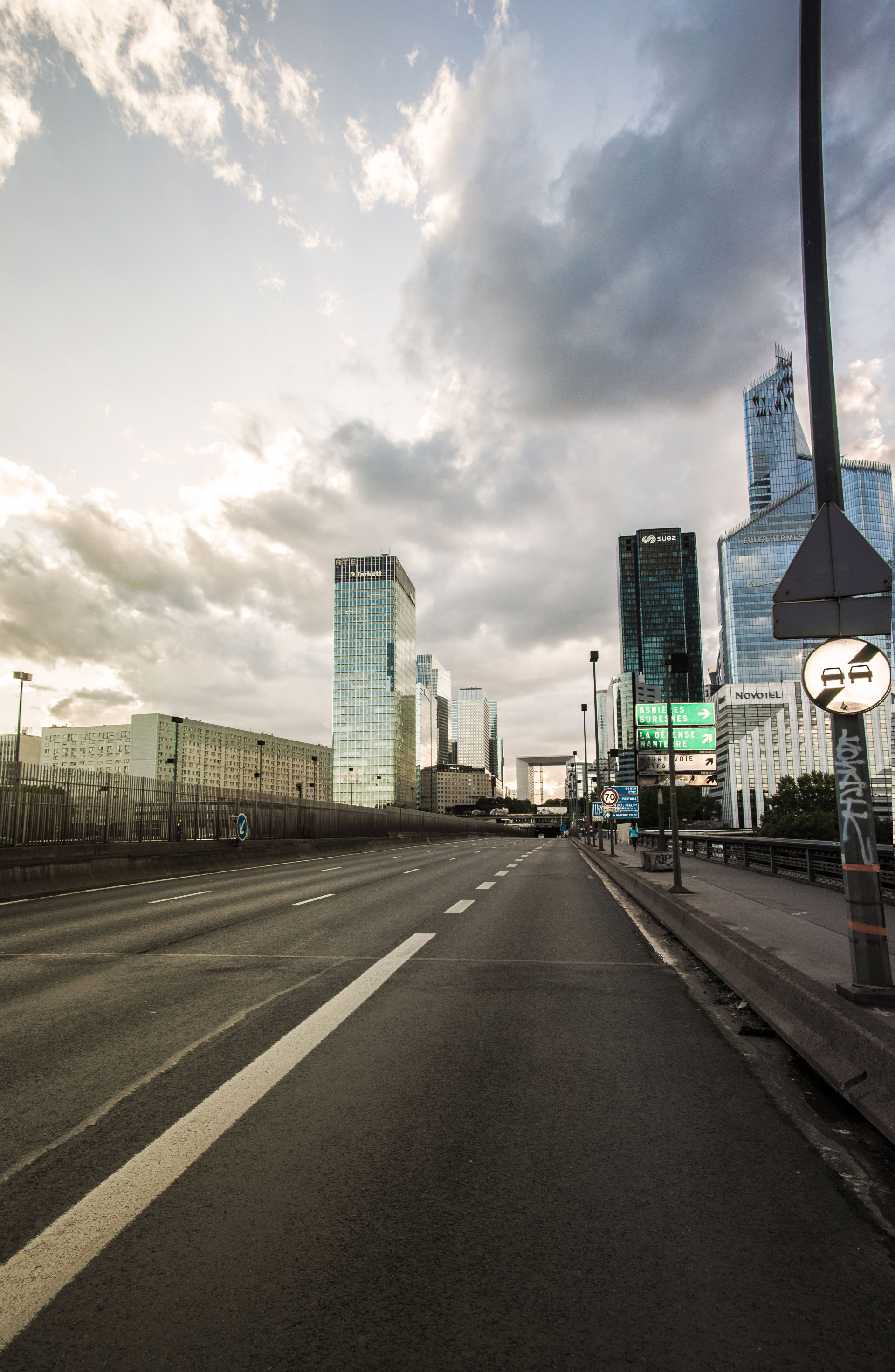 Paris Neuilly-Sur-Seine, view from the Pont de Neuilly, empty road and buildings of La Defense district, due to the new coronavirus COVID-19 2020, (Nos Dren)
