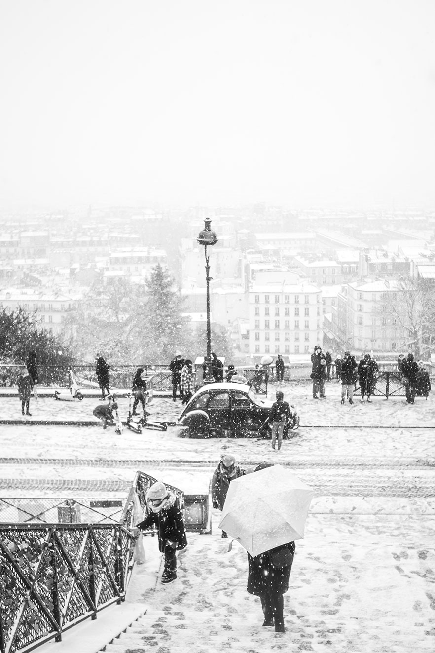 Paris under snowfall seen from the Basilica of the Sacré Coeur of Montmartre, Montmartre district, Paris, France 2021 (Nos Dren).
