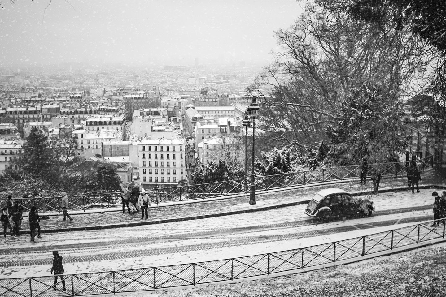 Paris under snowfall seen from the Basilica of the Sacré Coeur of Montmartre, Montmartre district, Paris, France 2021 (Nos Dren).